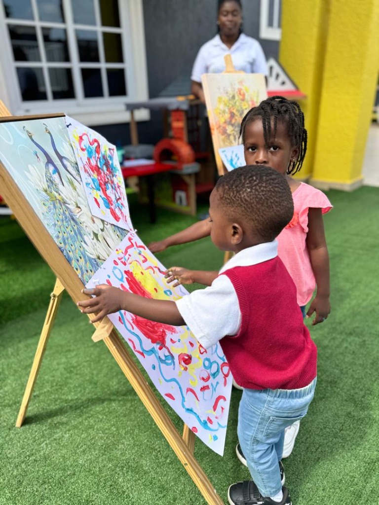 Children painting at HBIS